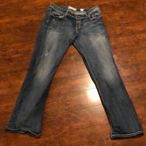 Distressed denim jeans